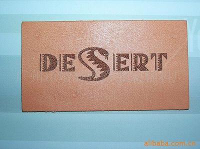 探索皮革标识世界 真皮皮章、服装商标与专业水洗标全解析